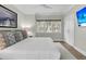 Spacious bedroom with king-size bed and large windows at 4910 Green Dolphin Way, Kiawah Island, SC 29455