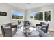 Relaxing sitting area with comfy armchairs and large windows at 4910 Green Dolphin Way, Kiawah Island, SC 29455