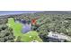 Aerial view of a house located on a golf course near the ocean at 4910 Green Dolphin Way, Kiawah Island, SC 29455