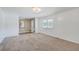 Bright living room with neutral carpeting and crown molding at 1090 Peru Rd, Saint Stephen, SC 29479