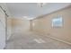 Spacious bedroom with carpeted floor, neutral walls, and barn door at 1090 Peru Rd, Saint Stephen, SC 29479