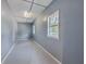 Unfinished storage room with grey walls and concrete floor at 1090 Peru Rd, Saint Stephen, SC 29479