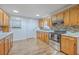 Modern kitchen with stainless steel appliances and wood cabinets at 1090 Peru Rd, Saint Stephen, SC 29479