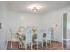 Elegant dining room featuring a formal table and chairs, hardwood floors, and crown molding at 1090 Peru Rd, Saint Stephen, SC 29479