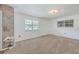 Spacious living room with neutral carpeting and large window at 1090 Peru Rd, Saint Stephen, SC 29479