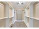 Large walk-in closet with ample shelving and hanging space at 1090 Peru Rd, Saint Stephen, SC 29479