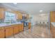 Open kitchen with stainless steel appliances and white countertops at 1090 Peru Rd, Saint Stephen, SC 29479