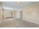 Bright bedroom featuring neutral walls and carpet, plus a barn door at 1090 Peru Rd, Saint Stephen, SC 29479