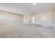 Spacious living room with neutral carpeting and ample natural light at 1090 Peru Rd, Saint Stephen, SC 29479