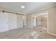 Open concept bedroom with connecting rooms and barn doors at 1090 Peru Rd, Saint Stephen, SC 29479