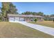 Brick ranch house with three-car garage and long driveway at 1090 Peru Rd, Saint Stephen, SC 29479