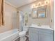 Updated bathroom with grey vanity, tile shower, and new fixtures at 1090 Peru Rd, Saint Stephen, SC 29479