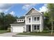 Two-story home with gray siding, white trim, and a two-car garage at 4 Wappoo Trace Ln, Summerville, SC 29486