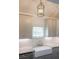 Farmhouse sink with brass faucet and gray quartz countertop at 59 Ashe St, Charleston, SC 29403