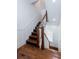 Well-maintained staircase with dark wood treads and white balusters at 59 Ashe St, Charleston, SC 29403