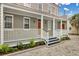 Charming home with a spacious front porch, perfect for relaxing and enjoying the outdoors at 59 Ashe St, Charleston, SC 29403