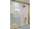 Bathroom with white subway tile and a gold framed shower/tub at 59 Ashe St, Charleston, SC 29403