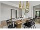 Dining room with wood table, seating for six, and chandelier at 15 Tidewater Ln, Summerville, SC 29486