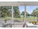 Relaxing porch with water views and white columns at 106 W Shipyard Rd, Mount Pleasant, SC 29464