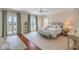 Spacious bedroom with king-size bed and access to a private balcony at 106 W Shipyard Rd, Mount Pleasant, SC 29464