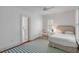 Cozy bedroom with a single bed and access to a private bathroom at 106 W Shipyard Rd, Mount Pleasant, SC 29464