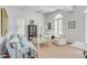 Light-filled living area featuring a comfortable sitting area and neutral decor at 106 W Shipyard Rd, Mount Pleasant, SC 29464