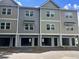 Three-story townhomes with attached garages at 217 Cache Ct # 9, Charleston, SC 29414