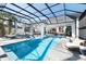 Resort-style pool and spa with covered lanai at Lot 93 Lady Banks Ln, Hollywood, SC 29470