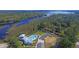 Aerial view of community pool and clubhouse near marsh at Lot 93 Lady Banks Ln, Hollywood, SC 29470