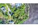 Aerial view of waterfront property with homes and dock at Lot 93 Lady Banks Ln, Hollywood, SC 29470