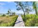 Wooden dock extending to the water with a view at Lot 93 Lady Banks Ln, Hollywood, SC 29470