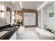 Elegant bathroom with double vanity, soaking tub, and walk-in shower at Lot 93 Lady Banks Ln, Hollywood, SC 29470