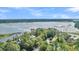 Aerial view of a waterfront community with mature trees at Lot 93 Lady Banks Ln, Hollywood, SC 29470