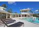 Resort-style pool with lounge chairs and covered cabana at Lot 93 Lady Banks Ln, Hollywood, SC 29470