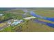 Aerial view of community, pool, and marsh at Lot 93 Lady Banks Ln, Hollywood, SC 29470