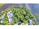 Aerial view of waterfront property with homes and dock at Lot 93 Lady Banks Ln, Hollywood, SC 29470