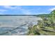 Aerial view of waterfront property with a wooden dock and calm water at Lot 93 Lady Banks Ln, Hollywood, SC 29470