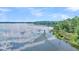 Aerial view showcasing waterfront property with lush greenery and calm waters at Lot 93 Lady Banks Ln, Hollywood, SC 29470