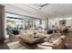Open living area with large sectional sofa and sliding doors leading to the pool at Lot 93 Lady Banks Ln, Hollywood, SC 29470