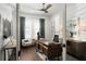 Bright home office with built-in desk and hardwood floors at Lot 93 Lady Banks Ln, Hollywood, SC 29470