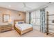 Charming bedroom with light wood furniture and patterned curtains at 9844 Haven Loop, Johns Island, SC 29455