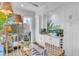 Relaxing outdoor bar with seating and white cabinetry at 9844 Haven Loop, Johns Island, SC 29455