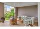 Relaxing outdoor patio with seating and lush greenery at 9844 Haven Loop, Johns Island, SC 29455