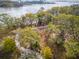 Aerial view of winding path through lush trees near waterfront at 9844 Haven Loop, Johns Island, SC 29455
