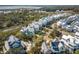 Aerial view of neighborhood with marsh and water views at 9844 Haven Loop, Johns Island, SC 29455