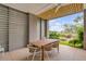 Outdoor patio with dining area and tranquil garden view at 9844 Haven Loop, Johns Island, SC 29455
