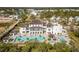 Resort-style pool with surrounding lounge chairs and a large clubhouse at 9844 Haven Loop, Johns Island, SC 29455