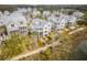 Aerial view of waterfront neighborhood with modern homes at 9844 Haven Loop, Johns Island, SC 29455