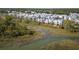 Aerial view of community with waterfront access at 9844 Haven Loop, Johns Island, SC 29455