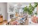 Bright living room with fireplace, large windows, and stylish furnishings at 9844 Haven Loop, Johns Island, SC 29455
